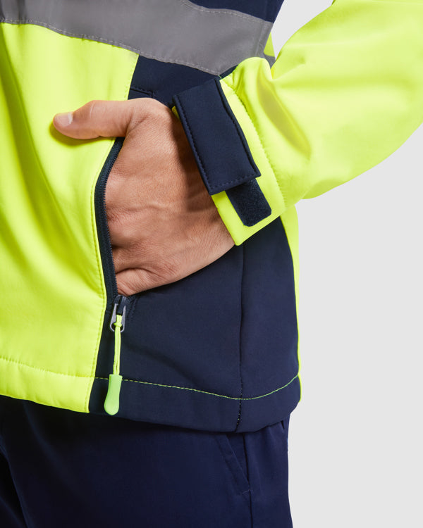 AV SOFTSHELL ANTARES T/S PLOMO/AMARILLO FLUOR